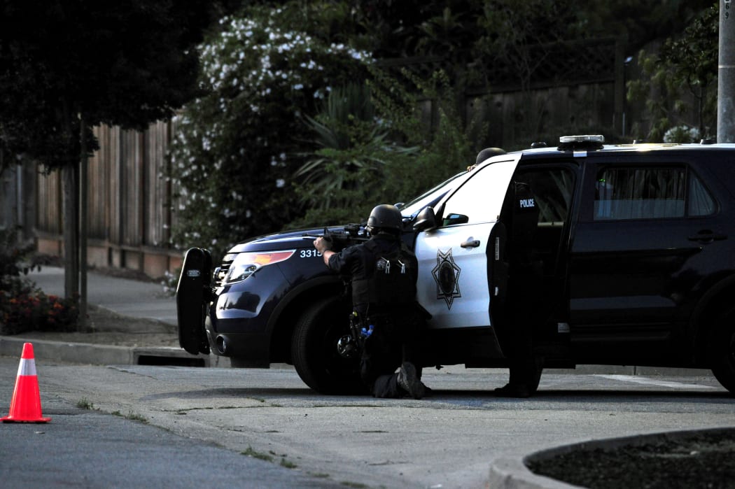 Sniper takes aim on a house where police thought a shooter from the shooting at the Gilroy Garlic festival might have been.