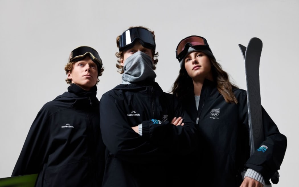 Snowboarder Cam Melville Ives, skier Fin Melville Ives and skier Mischa Thomas model the uniforms the New Zealand team will be wearing at the Winter Olympics in northern Italy in February.