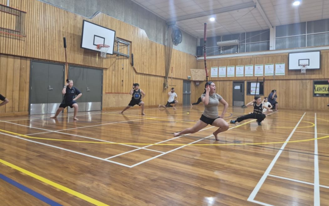 Mau rākau lessons with taiaha at Karamū High School.