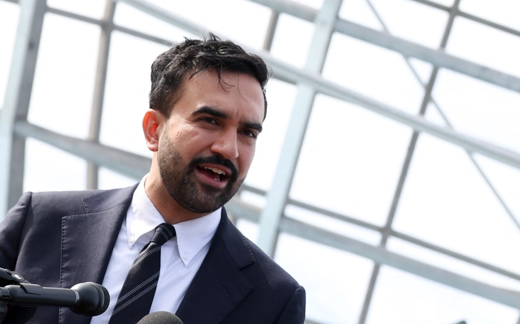 New York City mayor-elect Zohran Mamdani speaks during a news conference at Flushing Meadows–Corona Park in the Queens borough of New York City on November 5, 2025. Mamdani, 34, is the city's first Muslim mayor and the youngest to serve in more than a century. The Democratic socialist's victory came in the face of fierce attacks on his policies and his Muslim heritage from business elites, conservative media commentators and Trump himself. (Photo by TIMOTHY A. CLARY / AFP)