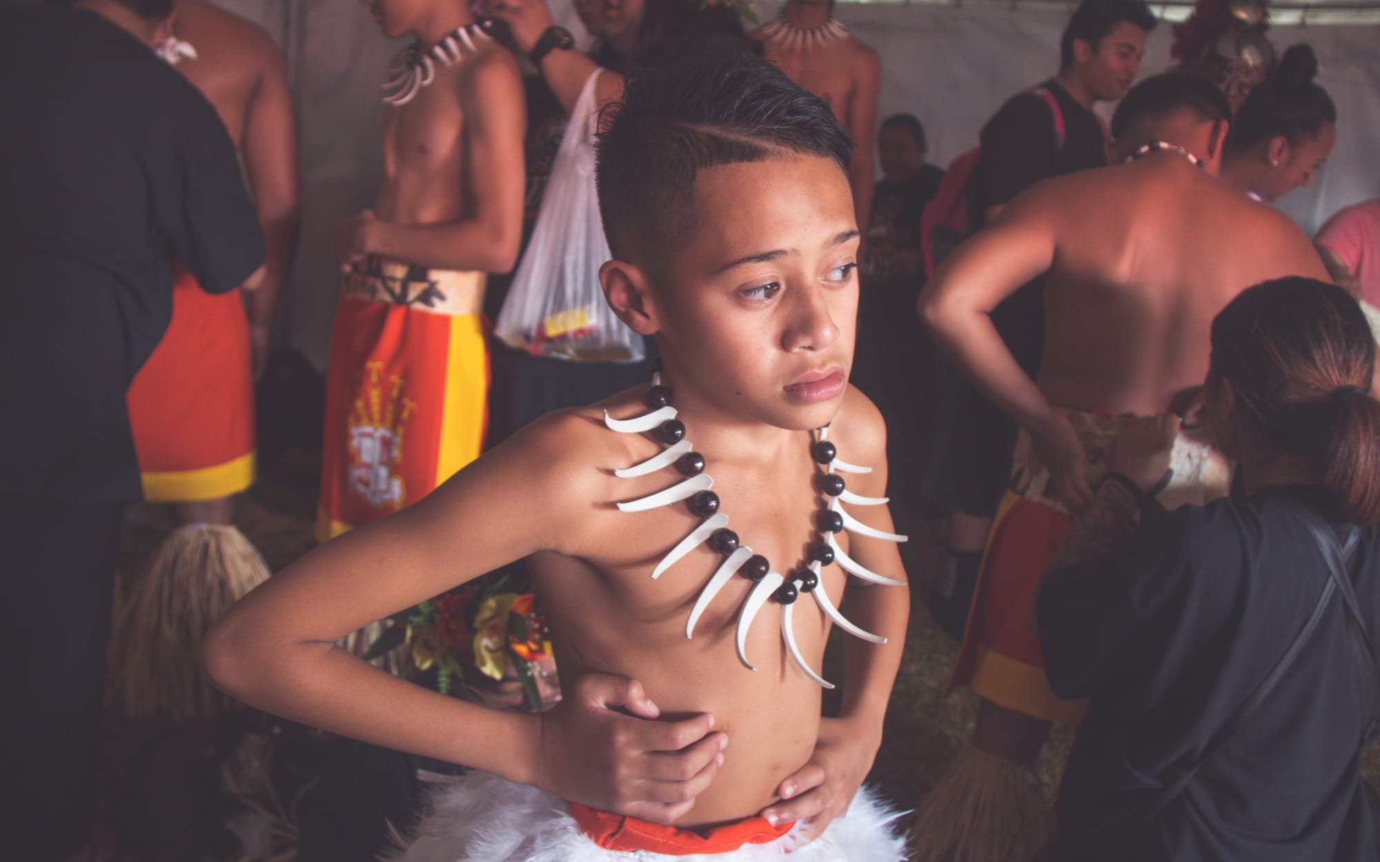 Saints Tuitama waits backstage as the St Paul's Samoan group prepares to compete at Polyfest.