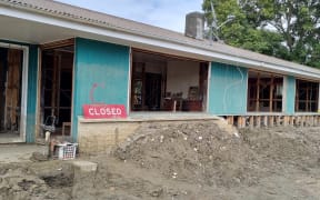 Rawinia Anderson has mixed feelings to her yellow-stickered family home.