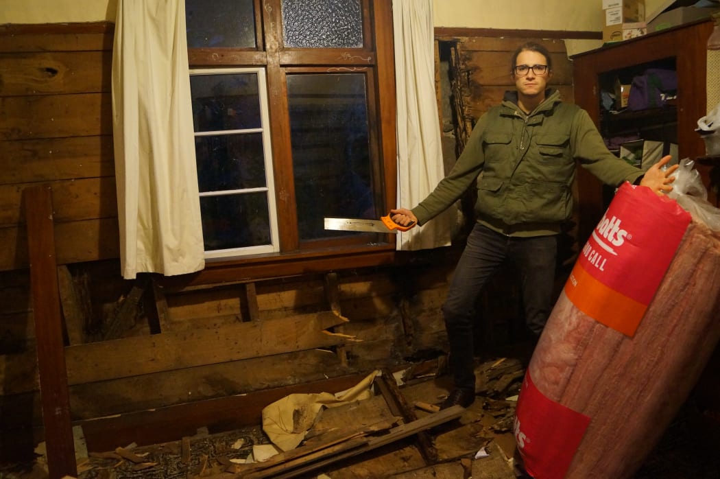 Tenants in this flat, dubbed one of Dunedin's worst, are insulating it themselves.