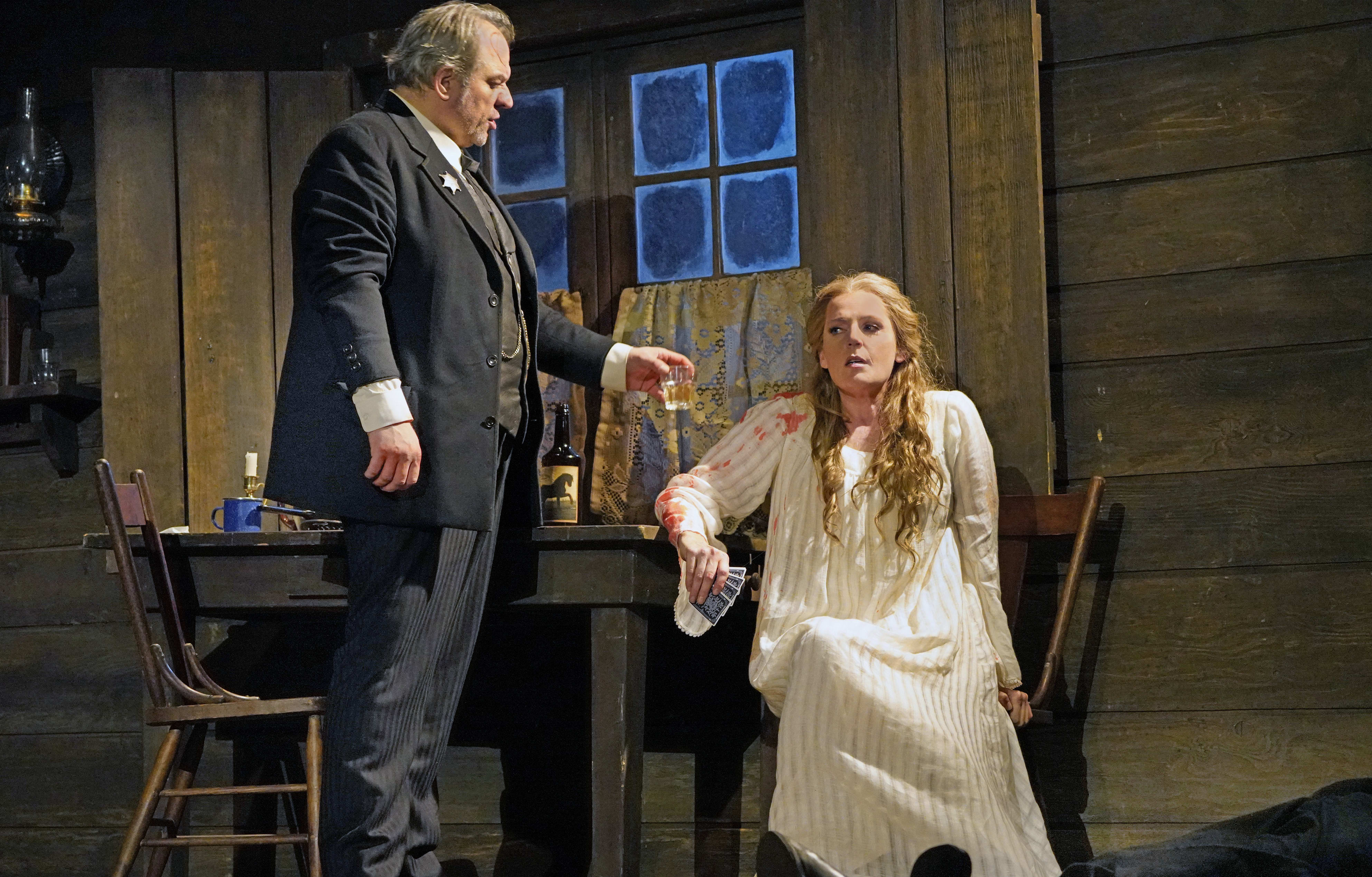 Željko Lučić as Jack Rance and Eva-Maria Westbroek as Minnie in Puccini's "La Fanciulla del West."