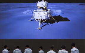 Technical personnel work at the Beijing Aerospace Control Center (BACC) in Beijing, capital of China, June 2, 2024. China's Chang'e-6 touched down on the far side of the moon on Sunday morning, and will collect samples from this rarely explored terrain for the first time in human history, the China National Space Administration (CNSA) announced.   Supported by the Queqiao-2 relay satellite, the lander-ascender combination of the Chang'e-6 probe successfully landed at the designated landing area at 6:23 a.m. (Beijing Time) in the South Pole-Aitken (SPA) Basin. (Xinhua/Jin Liwang) (Photo by JIN LIWANG / XINHUA / Xinhua via AFP)