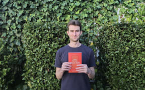 An image of Alex Bartley Catt and his book