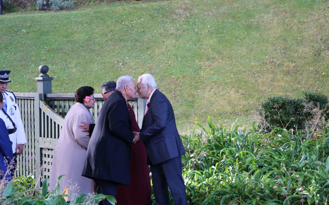 Samoa's Head of State (left) is greeted by Joe Harawira, Kaumatua to the Governor-General (right)