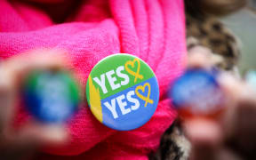 "Yes" campaigners pose at a photo call organised by the National Women's Council in Dublin, Ireland on March 5, 2024, ahead of the Irish Referendum on Friday. Ireland prepares to vote Friday on constitutional references to the family and women's role in the home after campaigns that have honed in on vague wording, 'mansplaining' and panic over polygamy. (Photo by PAUL FAITH / AFP)
