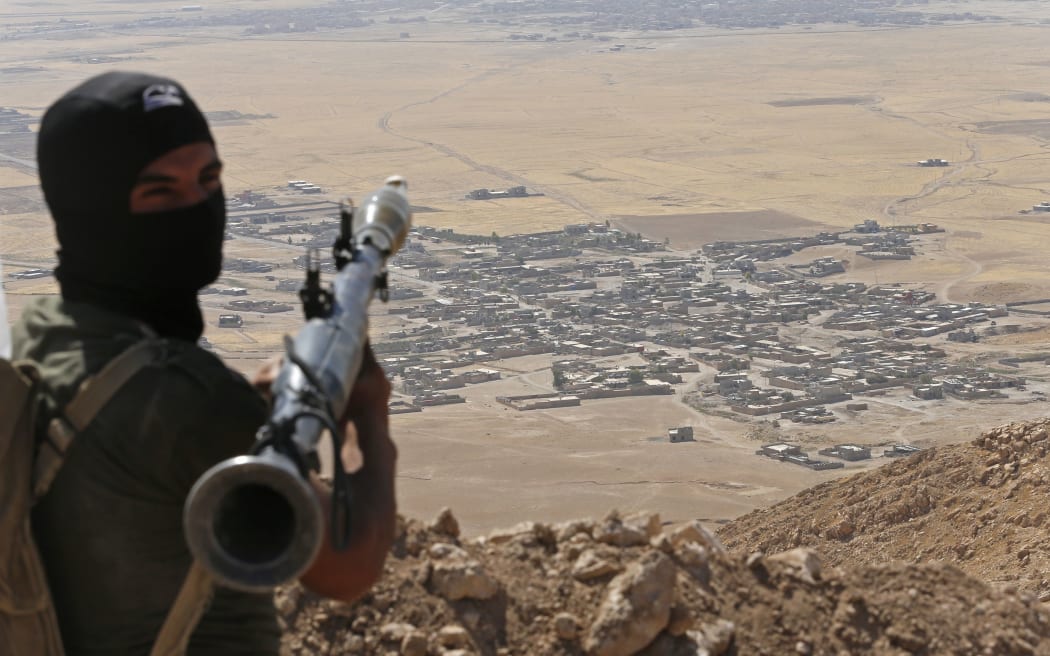 Kurdish Peshmerga fighters are attacking Islamic State positions near Mosul, Iraq.