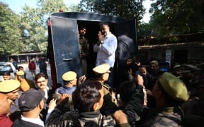 Gangster turned politician Mukhtar Ansari taken out from district court for money laundering case , in Allahabad on December 28,2022. (Photo by Ritesh Shukla ) (Photo by Ritesh Shukla/NurPhoto) (Photo by Ritesh Shukla / NurPhoto / NurPhoto via AFP)