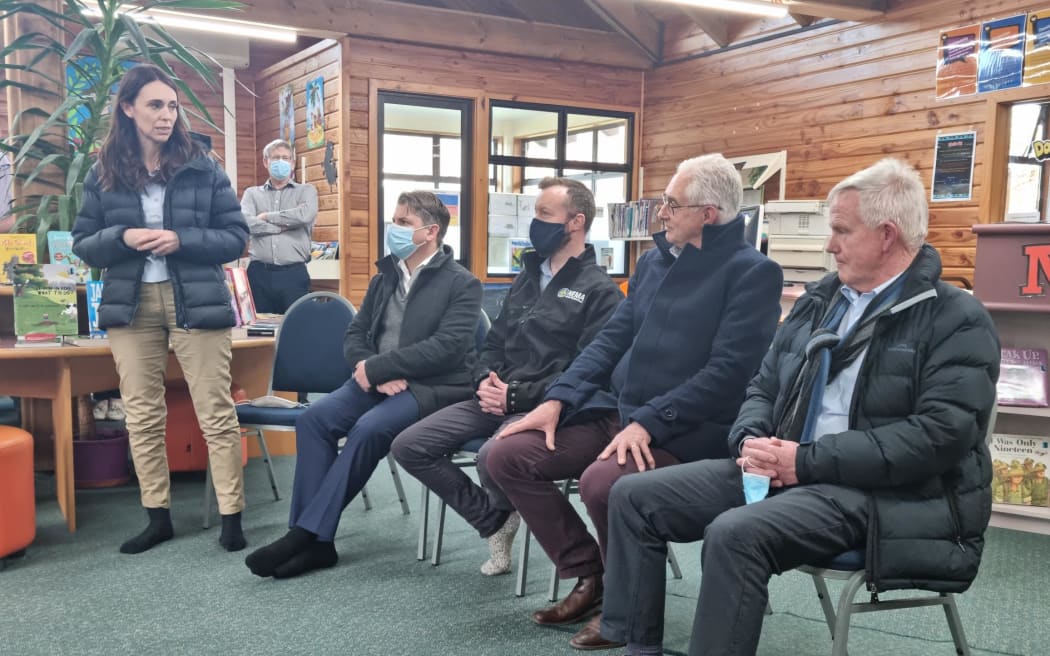 Prime Minister Jacinda Ardern greets members of the Rai Valley community at the Rai Valley Area School library on 1 September, 2022, with Transport Minister Michael Wood, Emergency Management Minister Kieran McAnulty, Marlborough District Council chief executive Mark Wheeler and Marlborough Mayor John Leggett.