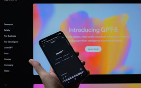 The ChatGPT 5 logo is displayed on a mobile phone. OpenAI announces GPT-5, its latest and most advanced AI model, in Brussels, Belgium, on August 8, 2025. (Photo by Jonathan Raa/NurPhoto) (Photo by Jonathan Raa / NurPhoto via AFP)