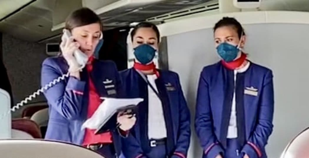 Latam cabin crew on repatriation flight to Rapa Nui or Easter Island.