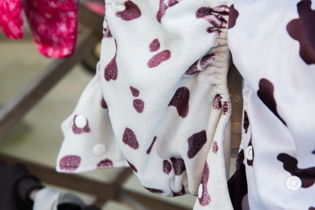 Reusable nappies hanging outside to dry.