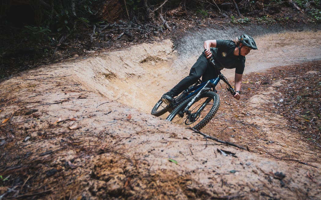 WORD chief executive Nicola Johnson rails a berm in Wellington's Matairangi, Mt Victoria.