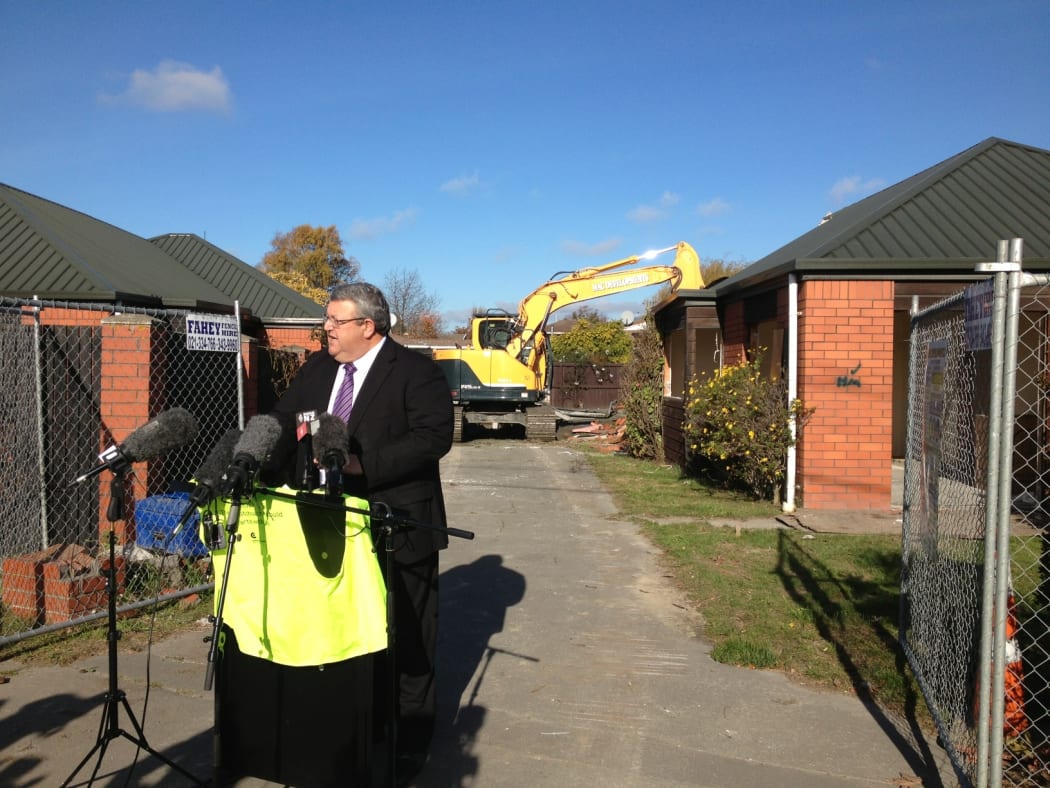Gerry Brownlee in the quake-affected suburb of Burwood on Wednesday.