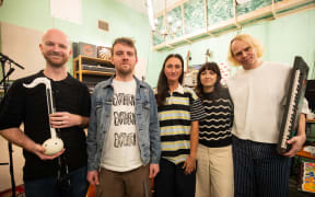 The Beths with Music 101 presenter Kara Rickard.