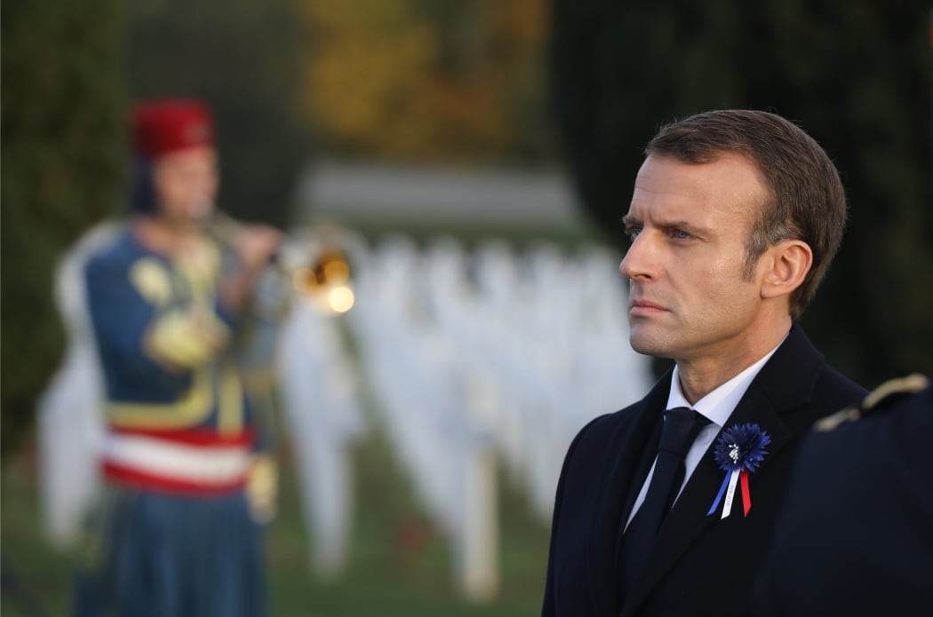 French President Emmanuel Macron stands at the cemetery by the Ossuary of Douaumont near Verdun, northeastern France.