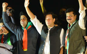 Pakistan's former Prime Minister and leader of the Pakistan Tehreek-e-Insaf party (PTI) Imran Khan, speaks during an anti-government protest rally in Islamabad on 20 August, 2022.