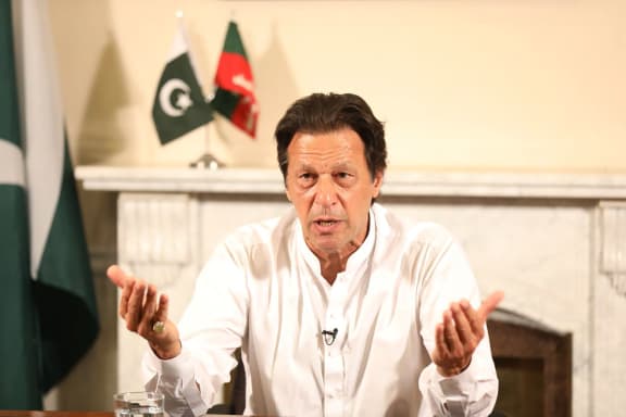 Pakistan's cricketer-turned politician Imran Khan, and head of the Pakistan Tehreek-e-Insaf party, addresses the nation at his residence in Islamabad a day after general election.