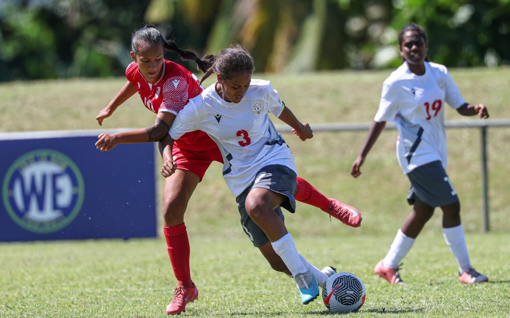New Caledonia's Emmanuelle Buama Tahiti's Kumuhei Kautai. OFC U-16 Women's Championship 2025, Tahiti v New Caledonia, Samoa Football HQ Apia, Monday 4 August 2025. Photo: Shane Wenzlick / www.phototek.nz