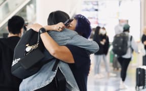 Emotional scenes at Auckland Airport after after the first fights from across the Tasman landed since the border reopening on 13 April 2022.