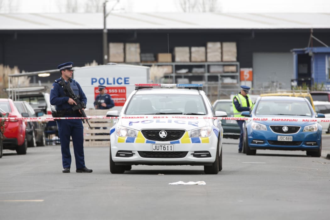 Police guard the site of a fatal shooting on Grasslands Place, Hamilton.