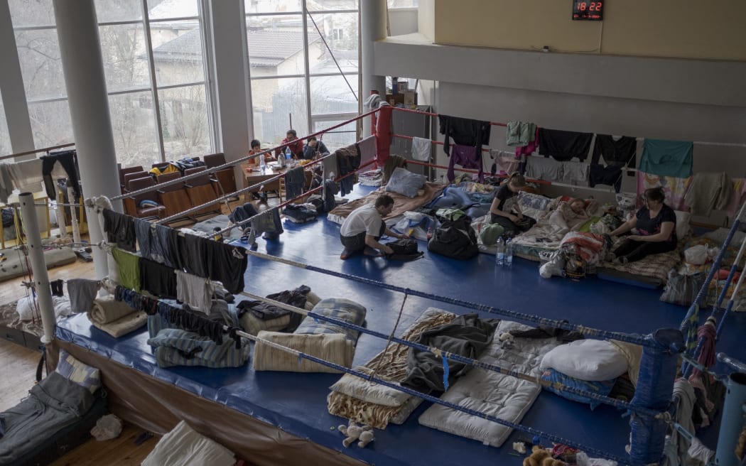 Civilians fleeing from the conflict zones in Kyiv, Kramatorsk, Kharkov, Mariupol, take temporary shelter at the sports hall of Lviv Polytechnic National University in Lviv, Ukraine on 7 April 2022.