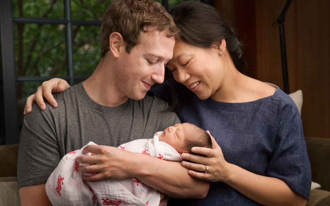Facebook CEO Mark Zuckerberg and his wife Priscilla with their new daughter Max.