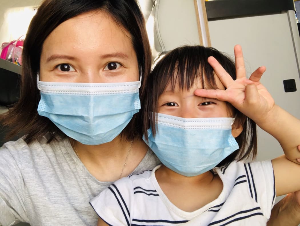 Lily Gao and her 2-year-old daughter Elysse are all packed to go home.