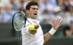 Novak Djokovic is all concentration at the All England Club