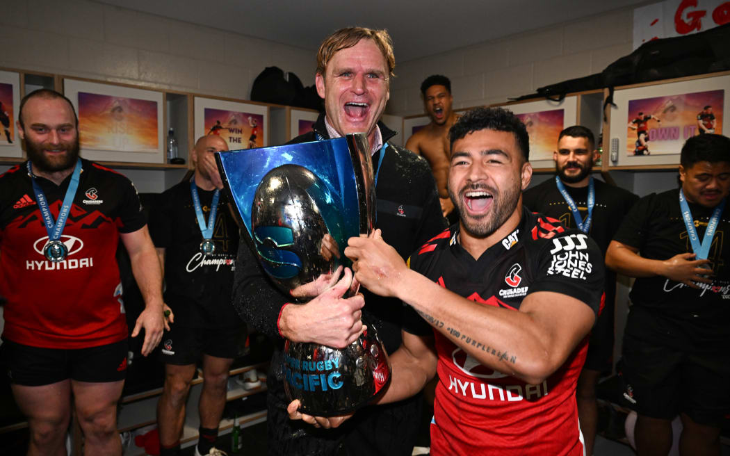Scott Robertson and Richie Mo'unga celebrate after winning the 2023 Super Rugby Pacific title.