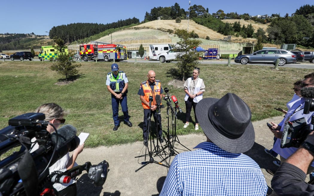 Fire and Emergency NZ incident controller Steve Kennedy, Police Inspector Ash Tabb and Anne Colombus from Christchurch City Council and Civil Defence deliver an update on the Port Hills fire.