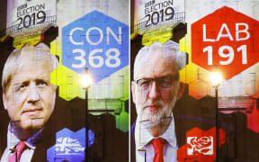 The broadcaster's exit poll results projected on the outside of the BBC building in London.
