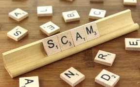 Scam spelled in scrabble