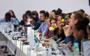 COP29 Baku Negotiating Tables - Ms Toiata Uili, of Government of Samoa and the lead negotiator for the Pacific for mitigation. (Center with yellow flower) "I know this is a climate finance COP but at the same time, it feels like we are derailing from the important stuff such as the work to reduce greenhouse gas emissions." November 2024