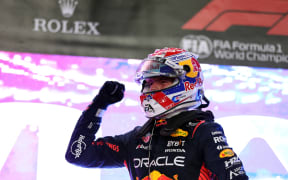 Max Verstappen of the Netherlands driving the Oracle Red Bull Racing celebrates in Qatar, 2023.