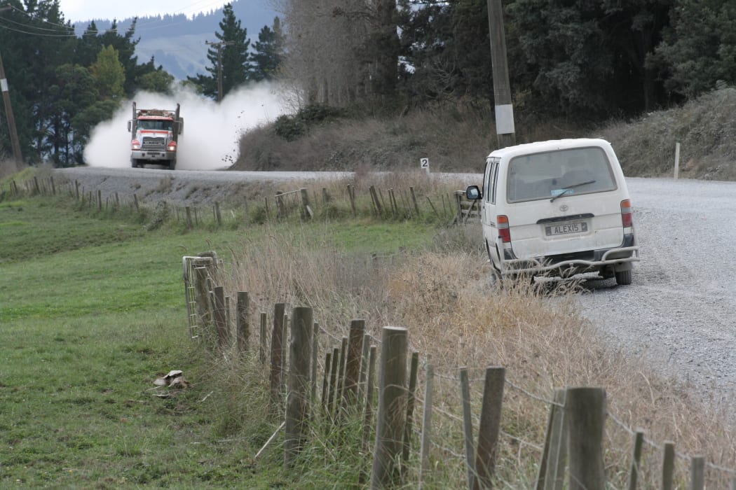 A logging truck on Wright's Road.