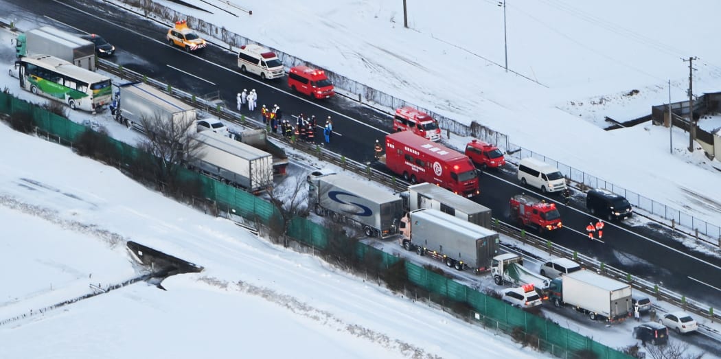 An aerial photo shows an accident site caused by snow on the Tohoku Expressway in Osaki City, Miyagi Prefecture, northern Japan, on January 19, 2021.