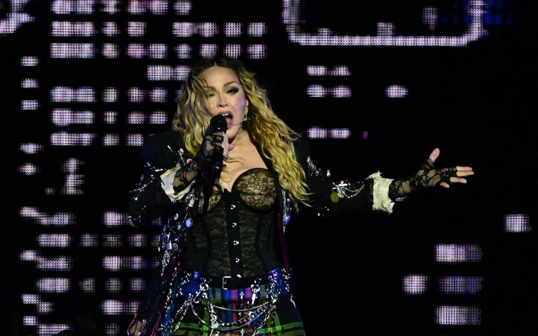 US pop star Madonna performs onstage during a free concert at Copacabana beach in Rio de Janeiro, Brazil, on May 4, 2024. . Madonna ended her “The Celebration Tour” with a performance attended by some 1.5 million enthusiastic fans. (Photo by Pablo PORCIUNCULA / AFP)