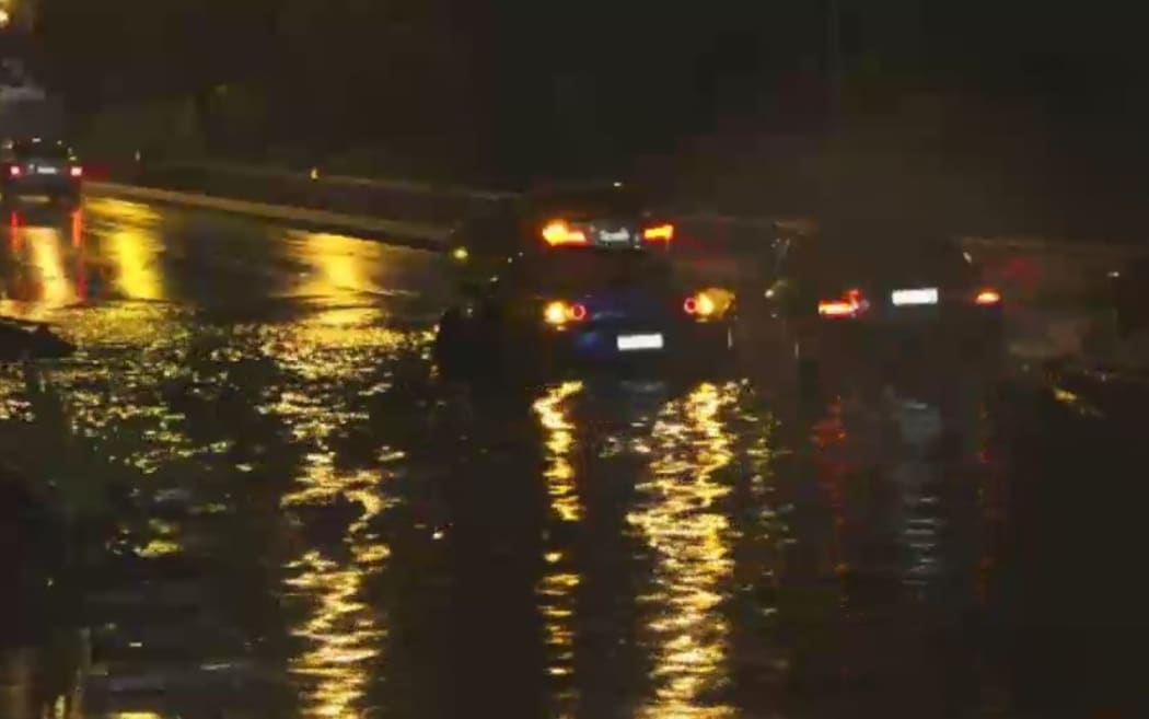 Drivers are trapped by rising floodwaters in New South Wales.