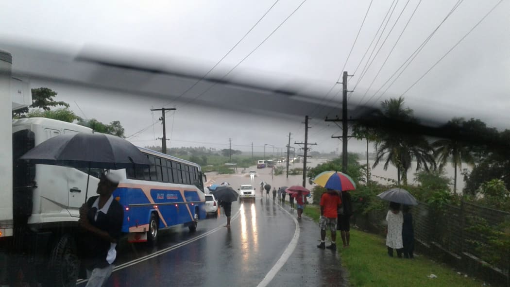 The main Queens Road in Fiji's west  flooded near Nadi on February 8 2017