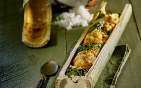 Curried fish in bamboo with coconut rice