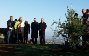 Several hundred people attended a dawn ceremony to plant nine native trees at the top of Auckland's Māungakiekie, or One Tree Hill, this morning.