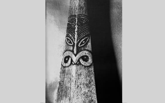 Detail Carved bone paddle