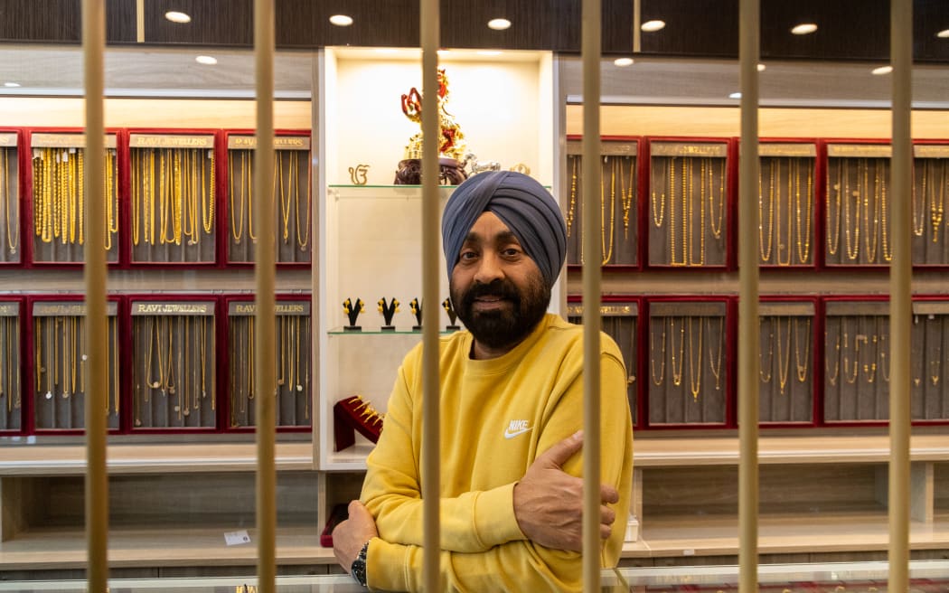 Ravindra Singh, owner of Ravi Jewellers, says the metal cages inside his store create anxiety for customers.