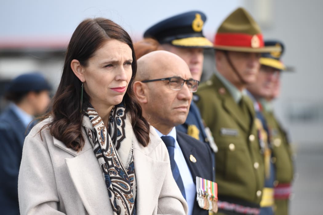 Prime Minister Jacinda Ardern and Defence Minister Ron Mark at the ramp ceremony at Auckland International Airport.