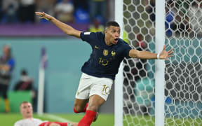 DOHA, QATAR - NOVEMBER 26: Kylian Mbappe of France celebrates after his goal during the FIFA World Cup Qatar 2022 Group D match between France and Denmark at Stadium 974 in Doha, Qatar on November 26, 2022. Mustafa Yalcin / Anadolu Agency (Photo by MUSTAFA YALCIN / ANADOLU AGENCY / Anadolu Agency via AFP)