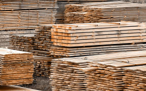 Stacked wood spruce and pine timber for construction buildings