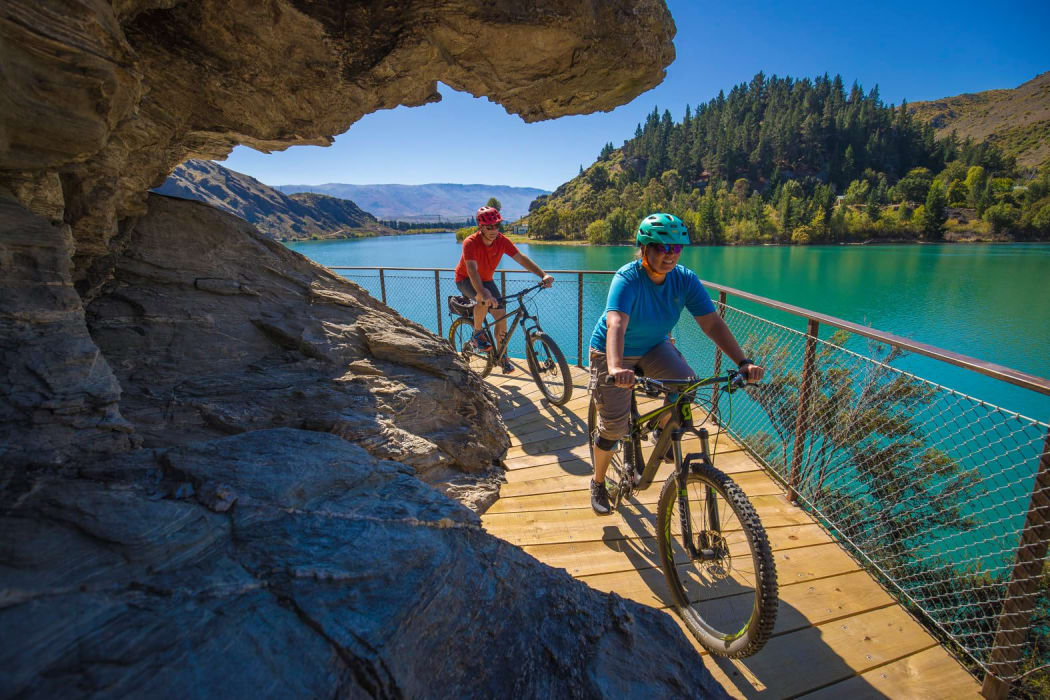 Riders on the Lake Dunstan Cycle track.